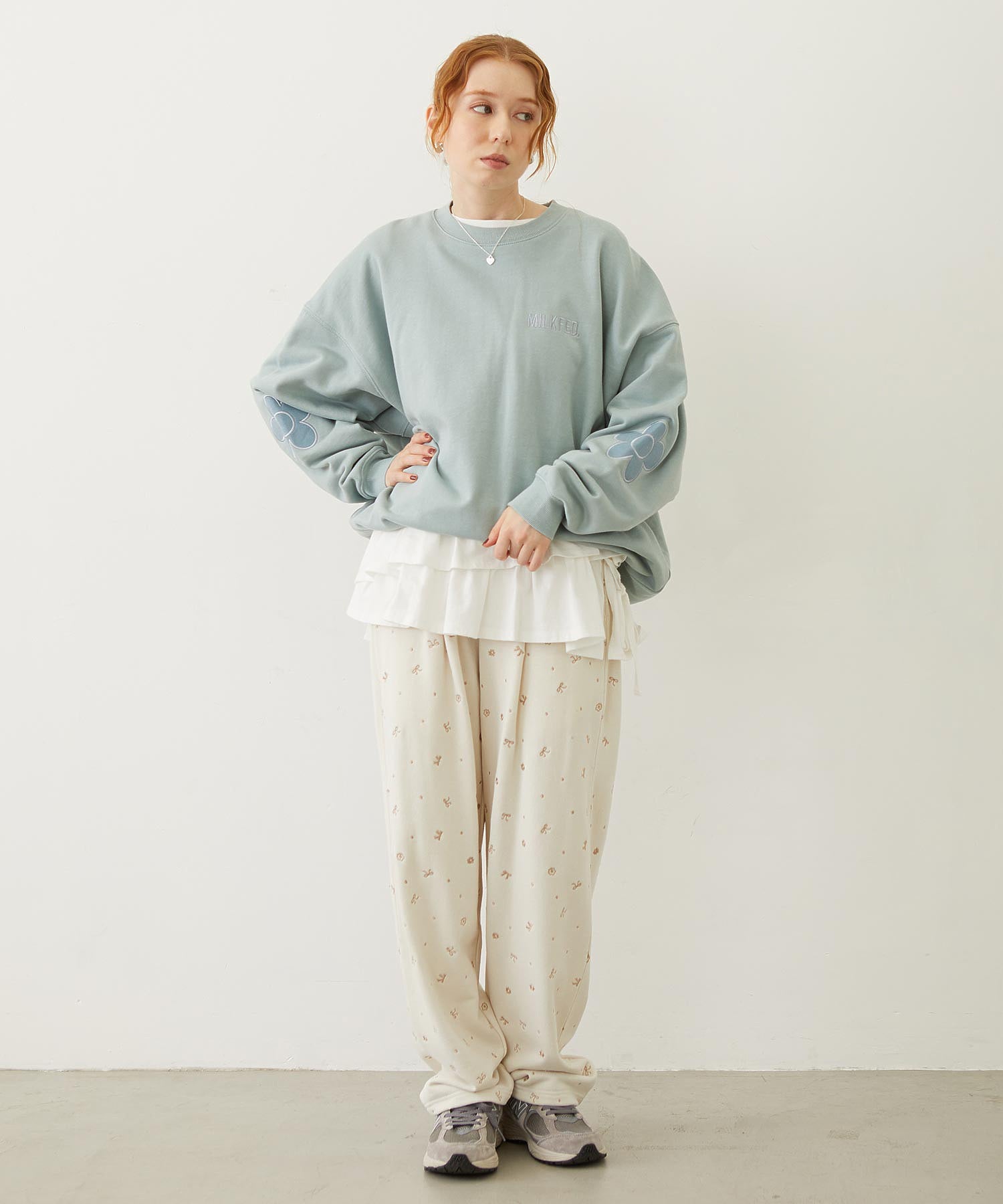 FLOWER ELBOW PATCH SWEAT TOP