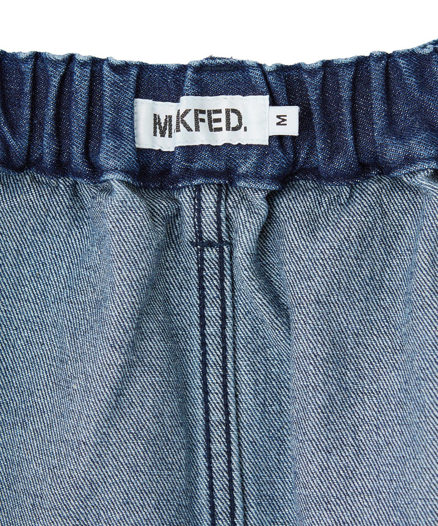 PANELED POCKET DENIM MINI SKIRT