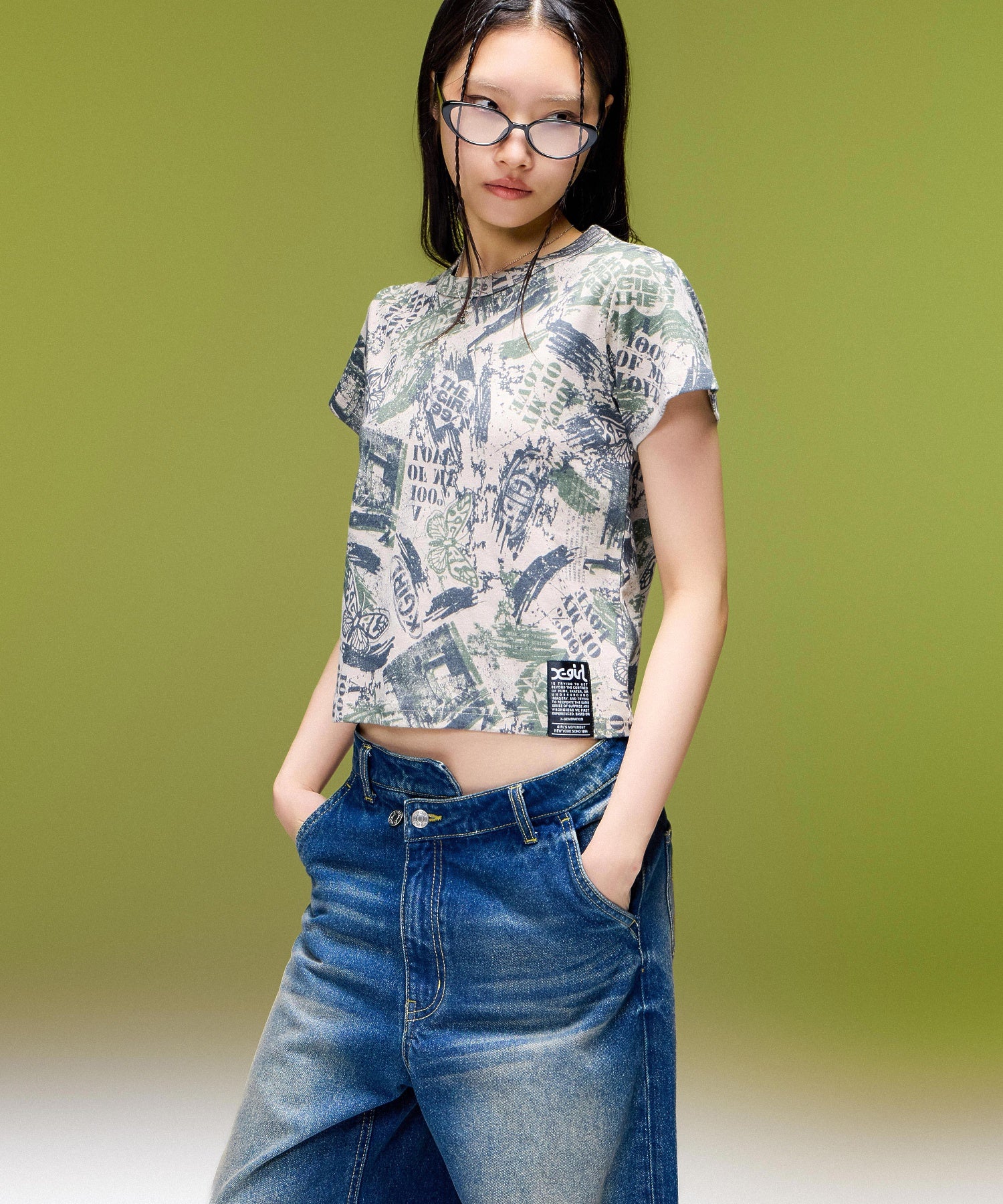 EMBLEM POCKET ASYMMETRIC WAIST DENIM PANTS