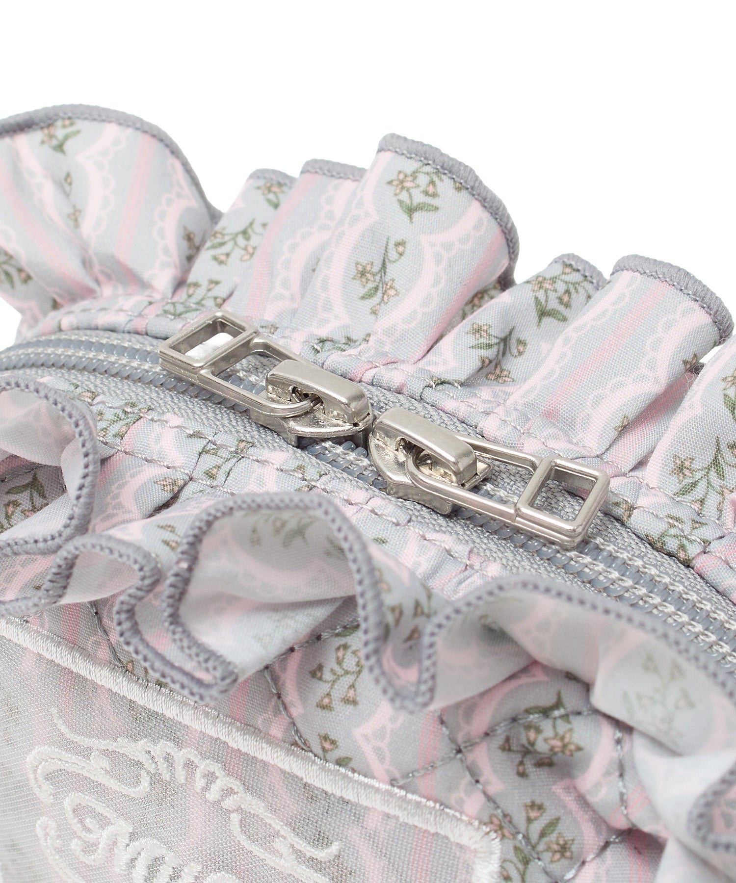 STRIPED FLOWER QUILTED POUCH