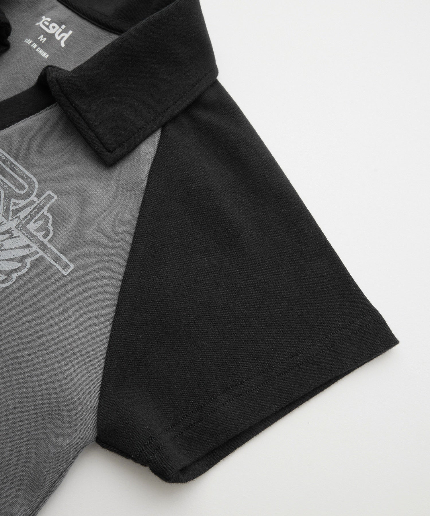 HEART AND WING LOGO RAGLAN POLO TOP