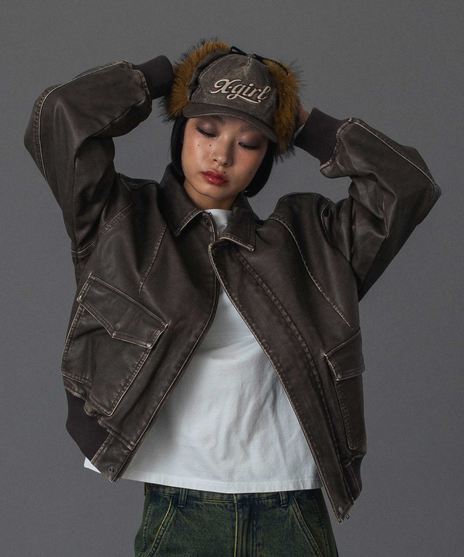 EMBOSSED LOGO PATCH DISTRESSED FAUX LEATHER JACKET
