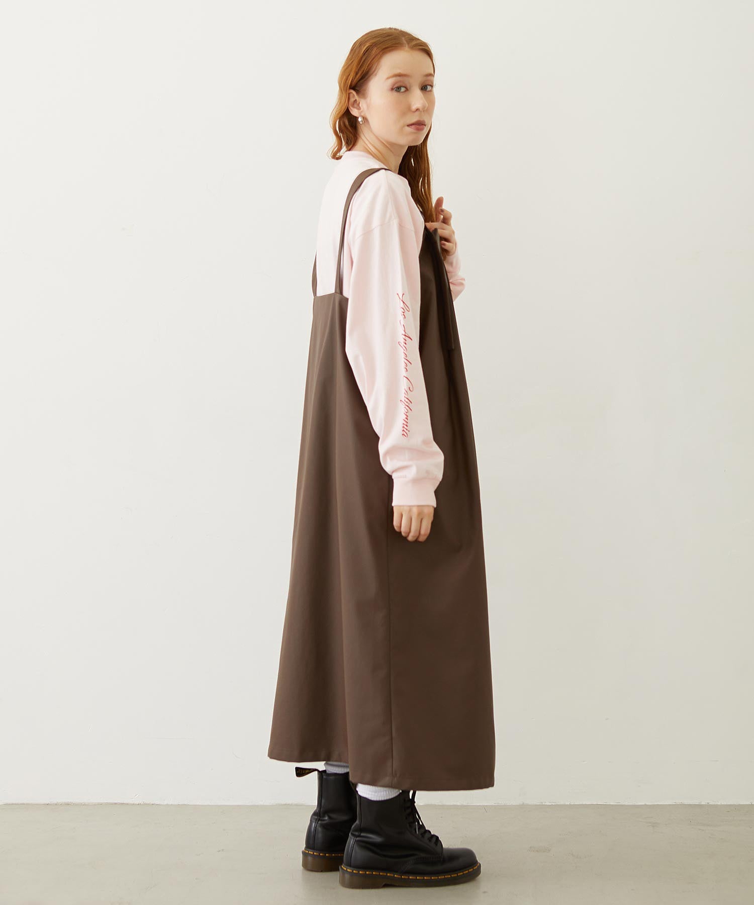 FAUX LEATHER TUCK DRESS