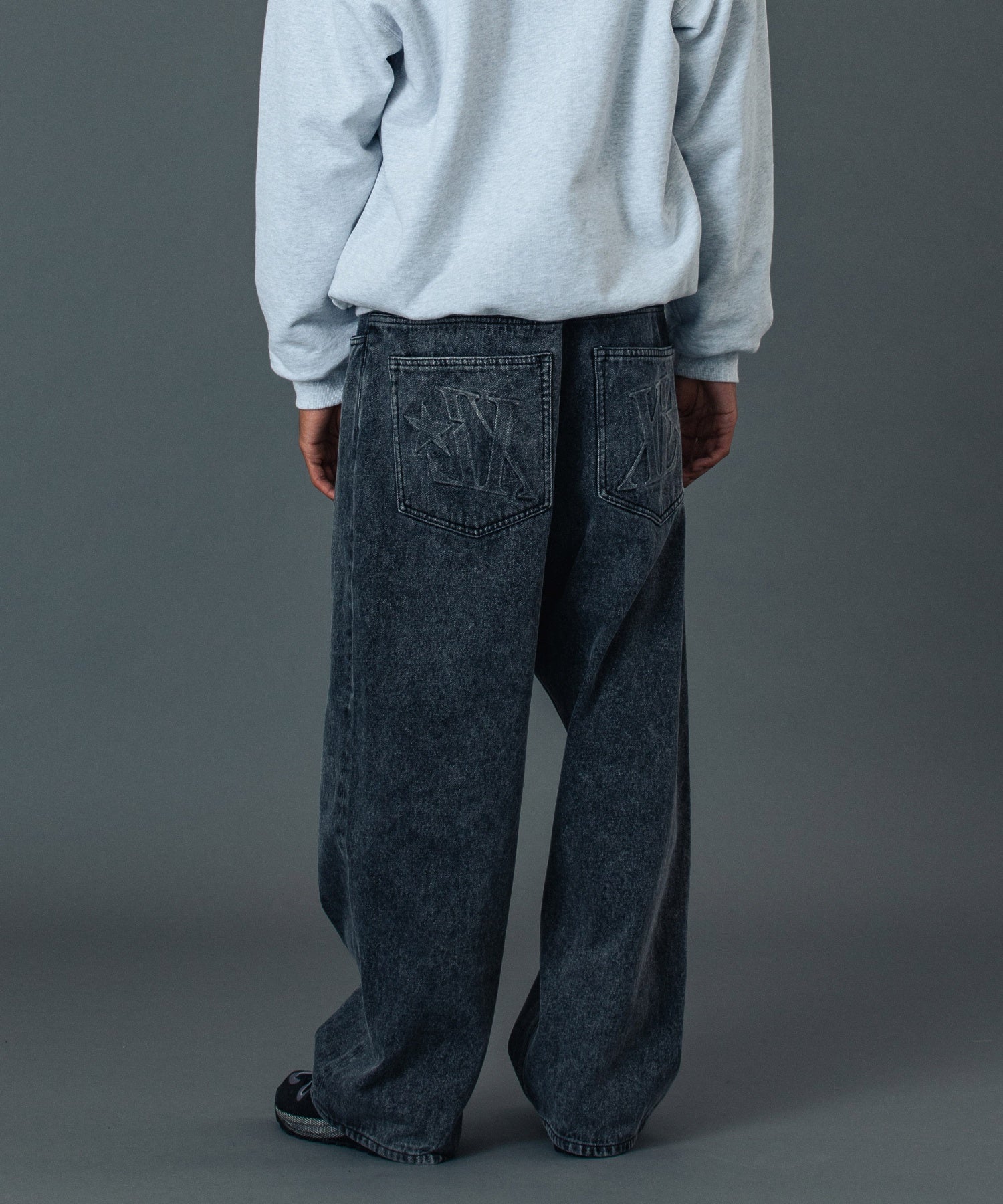 EMBOSSED DENIM PANTS