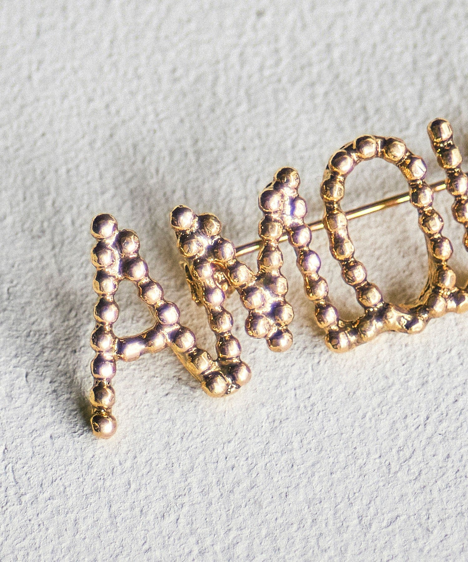 ADER.bijoux/CUTSTEEL AMOUR BROOCH