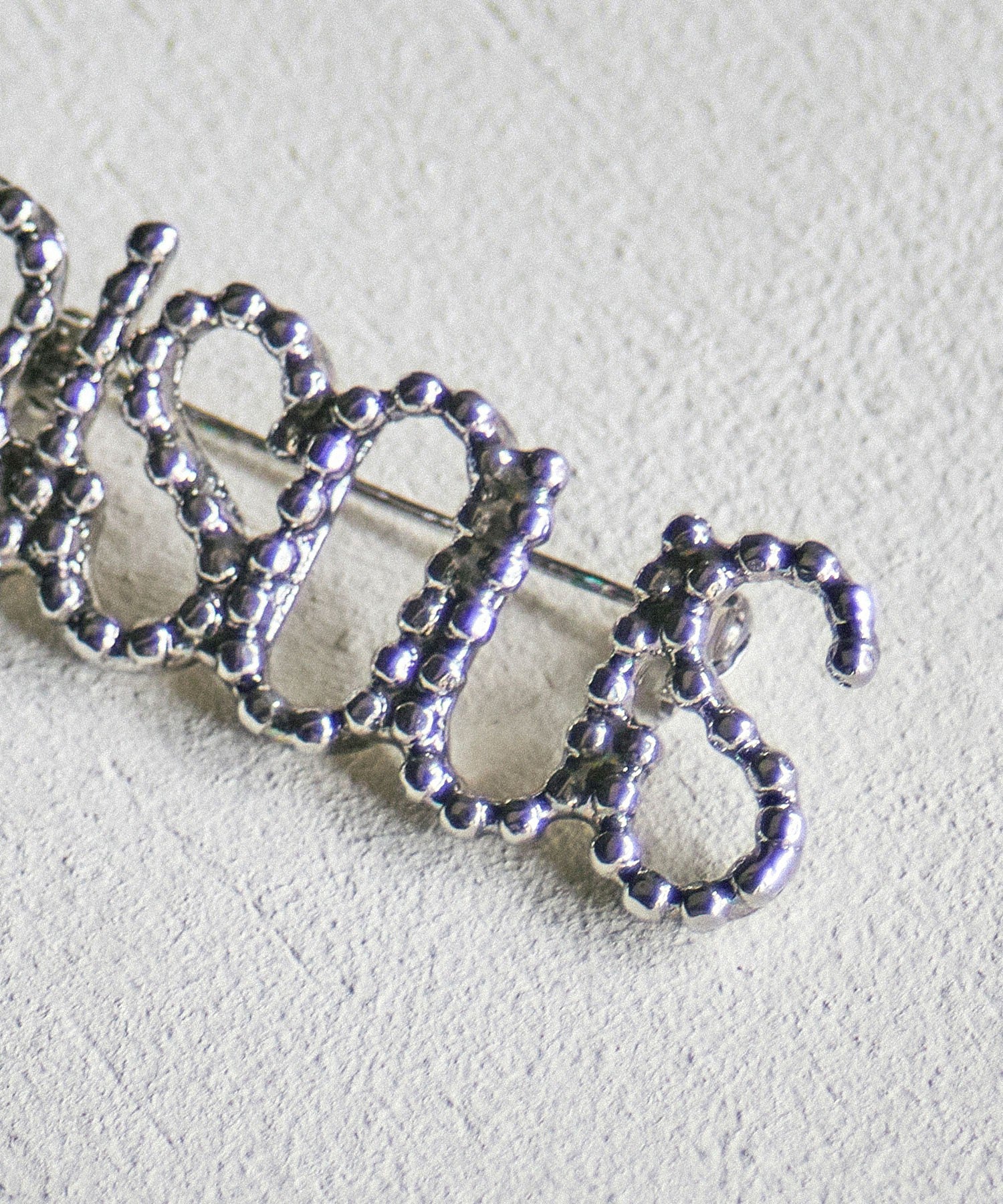 ADER.bijoux/CUTSTEEL BISOUS BROOCH