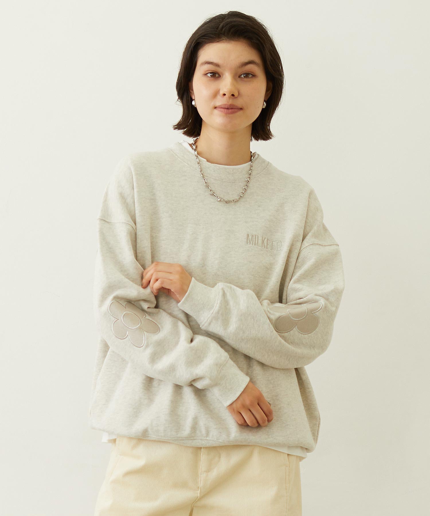 FLOWER ELBOW PATCH SWEAT TOP