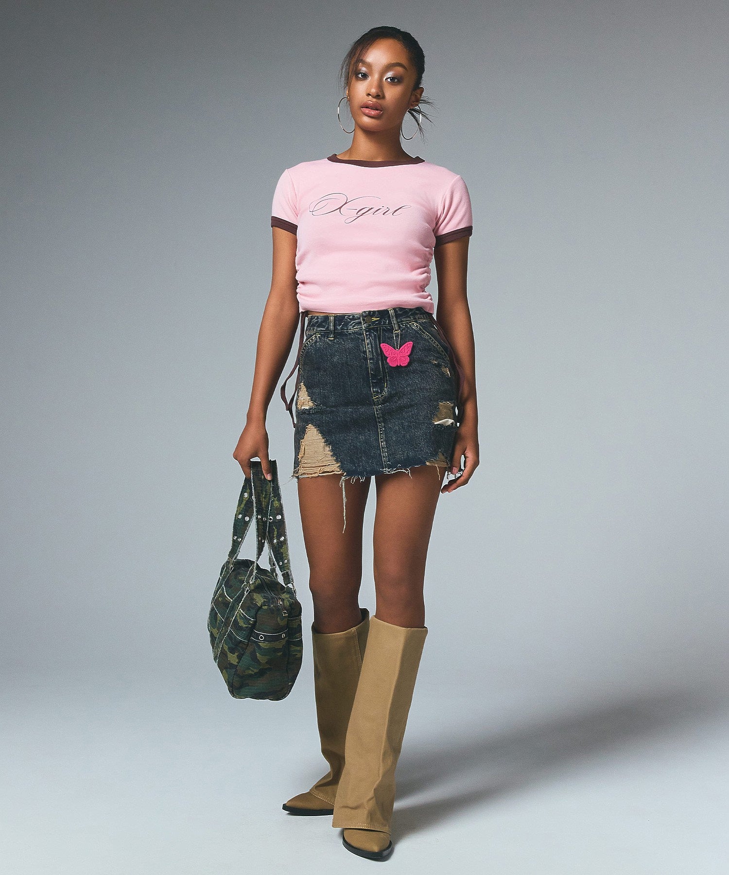 DISTRESSED DENIM MINI SKIRT