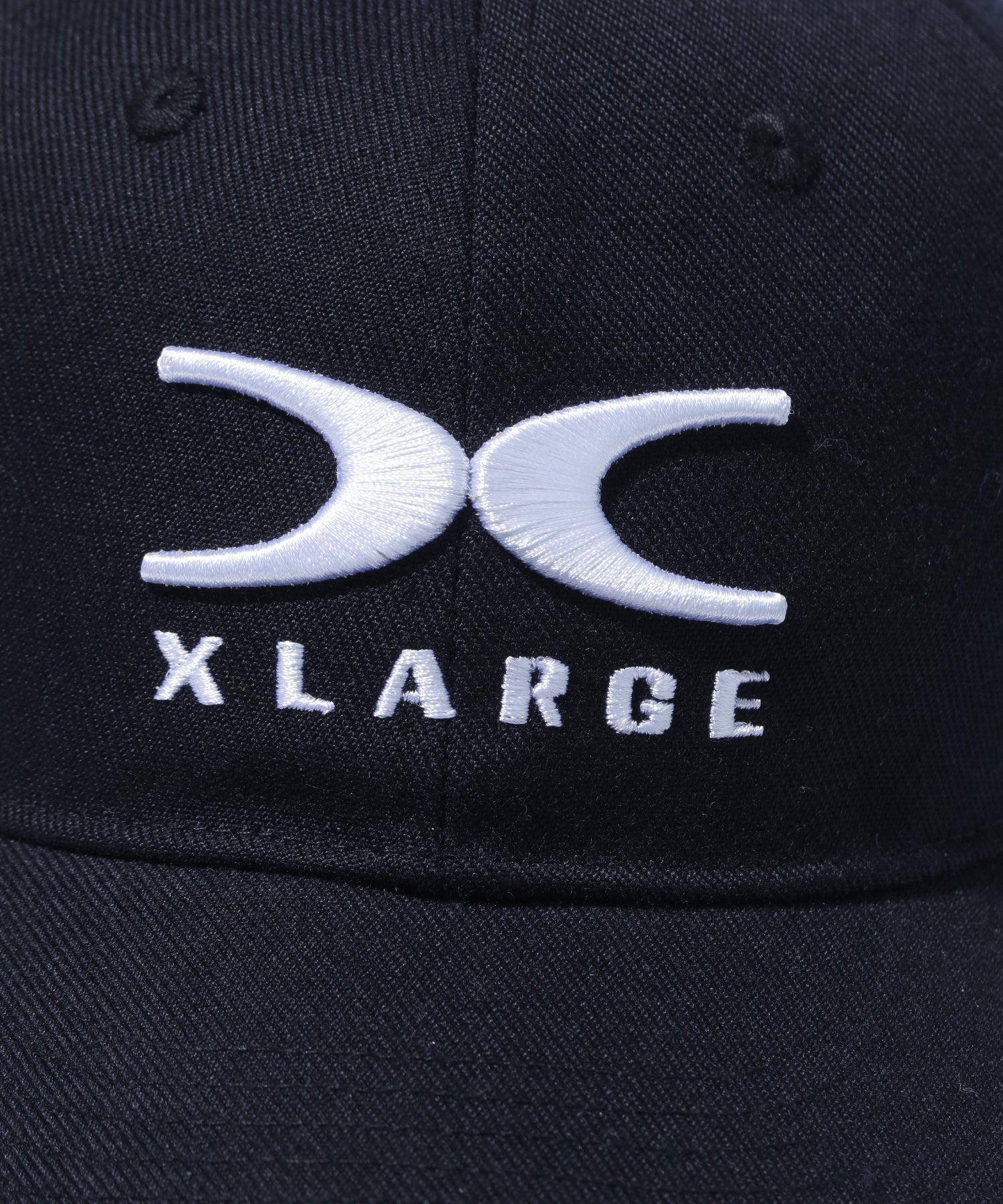 X CAP