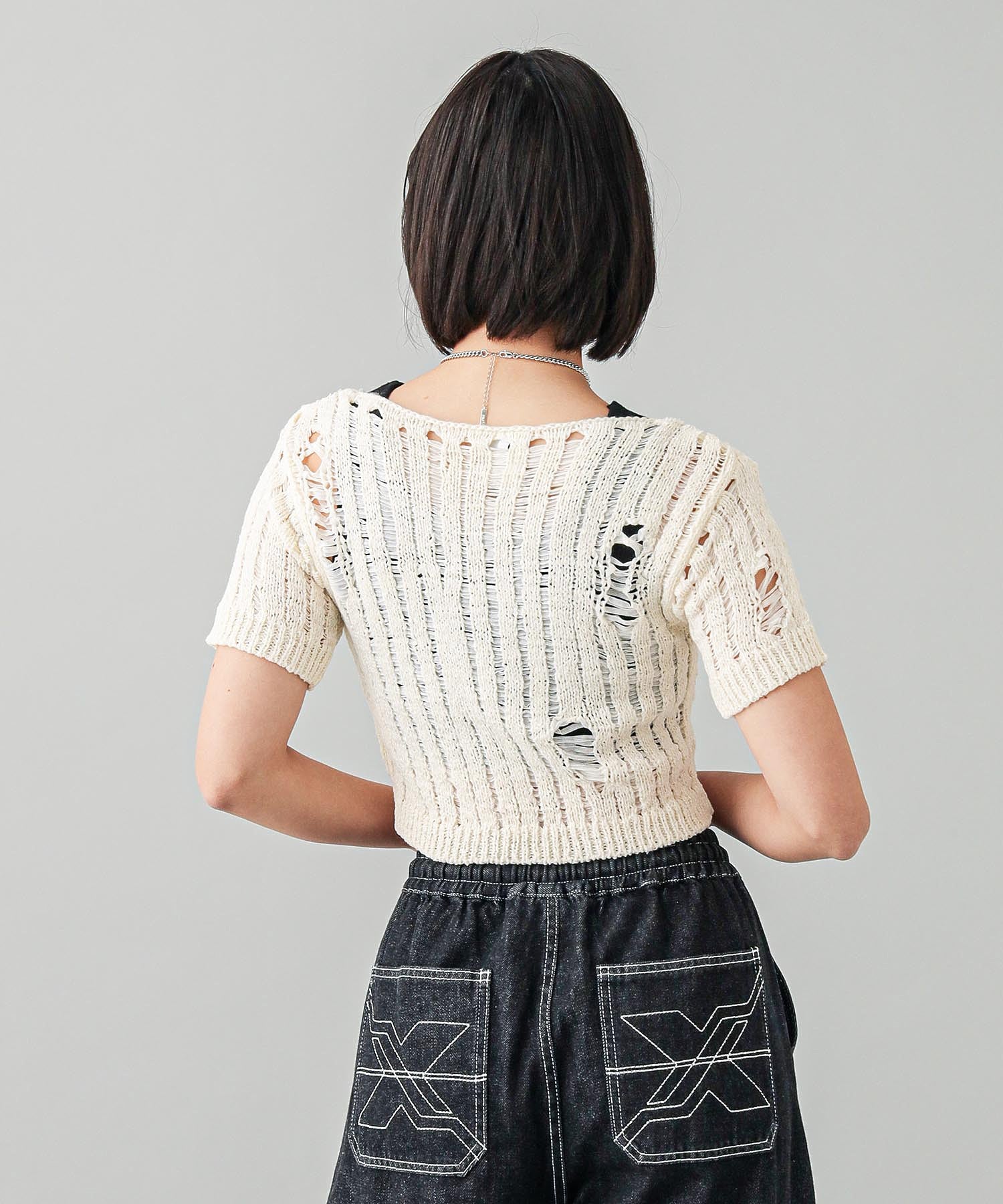 DISTRESSED TAPE YARN KNIT TOP