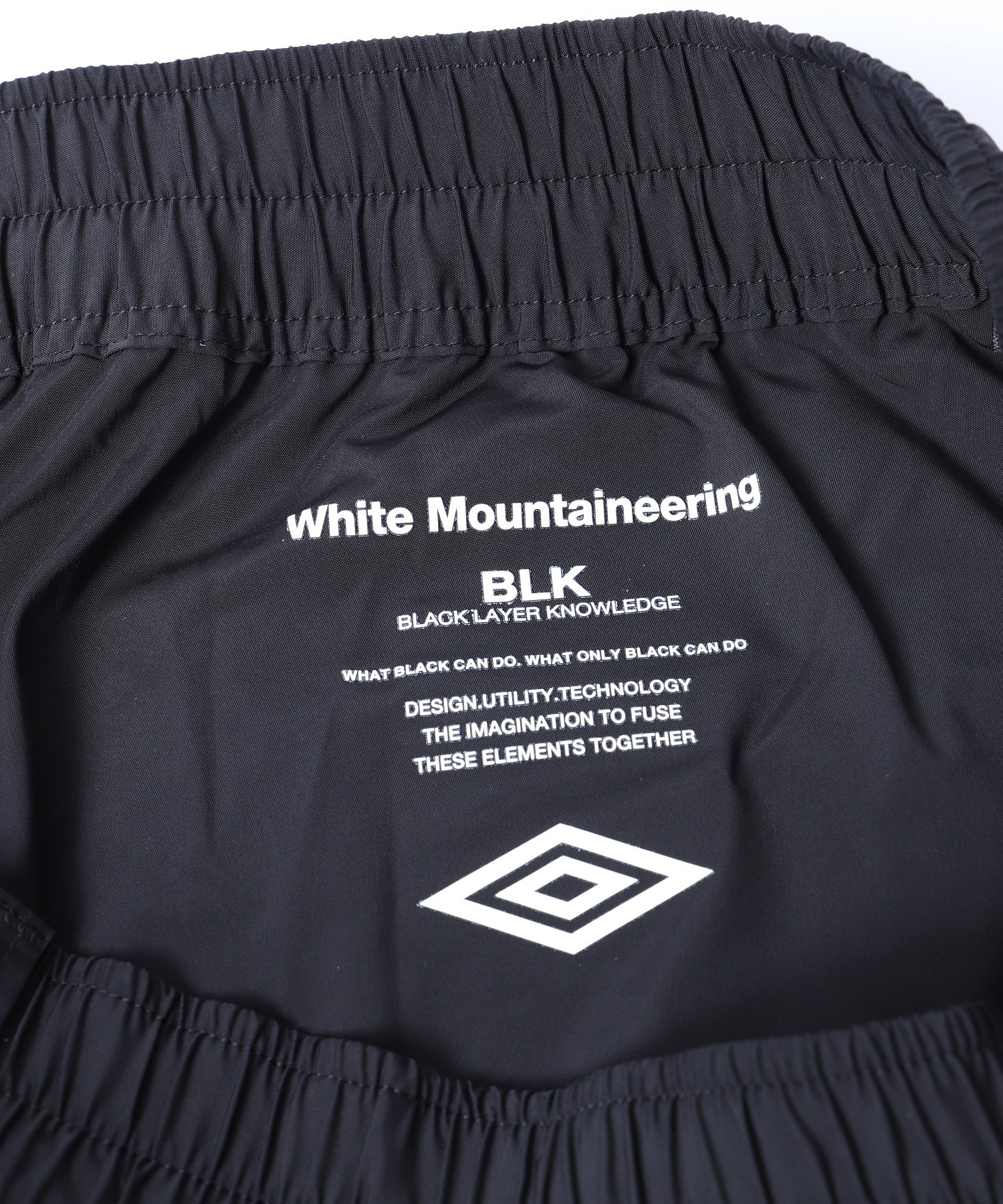 WHITE MOUNTAINEERING/ホワイトマウンテニアリング/WM×UMBRO EASY CARGO PANTS/BK2473402