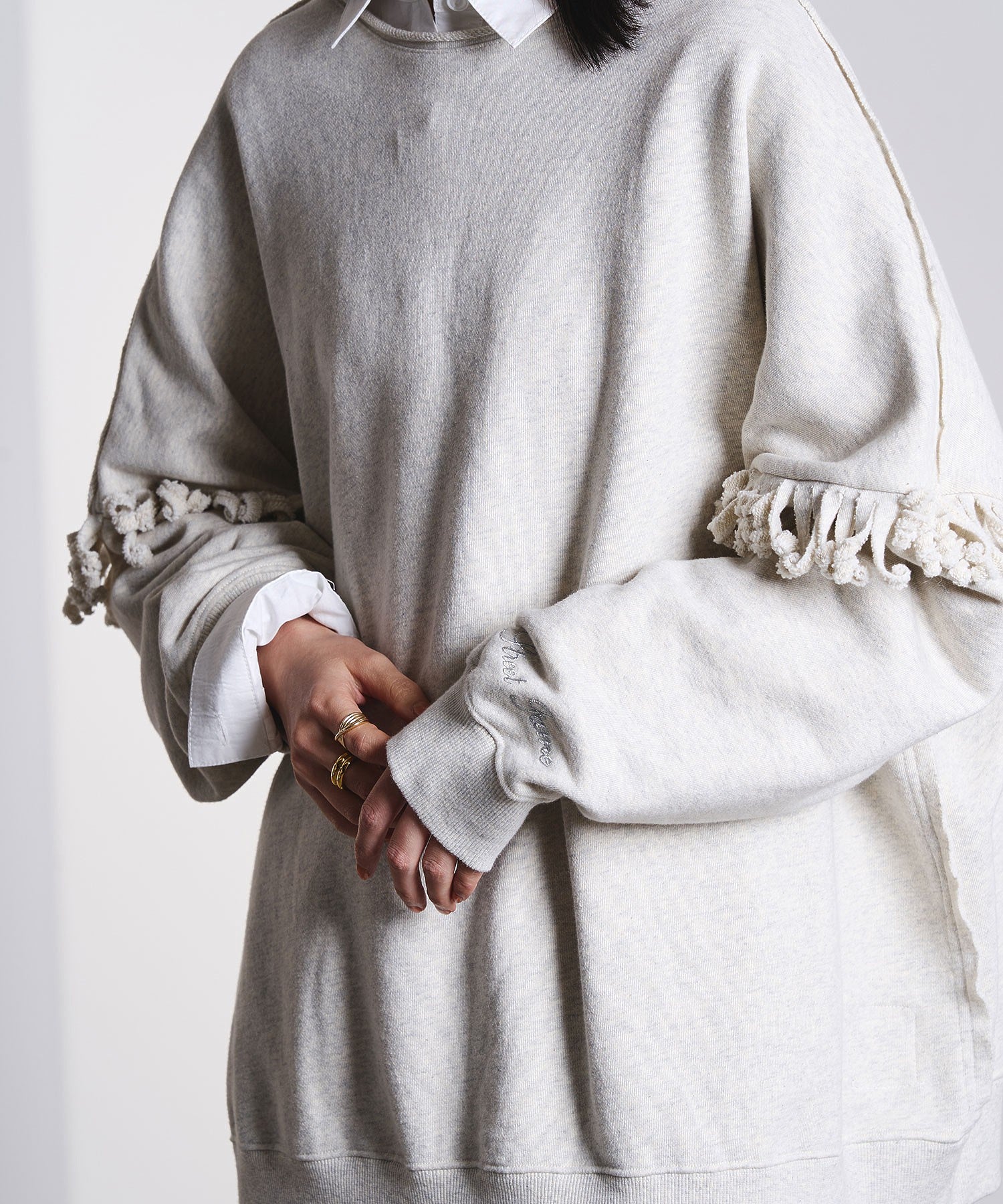 GENE HEAVENS/FRONT AND BACK FRINGE SWEAT