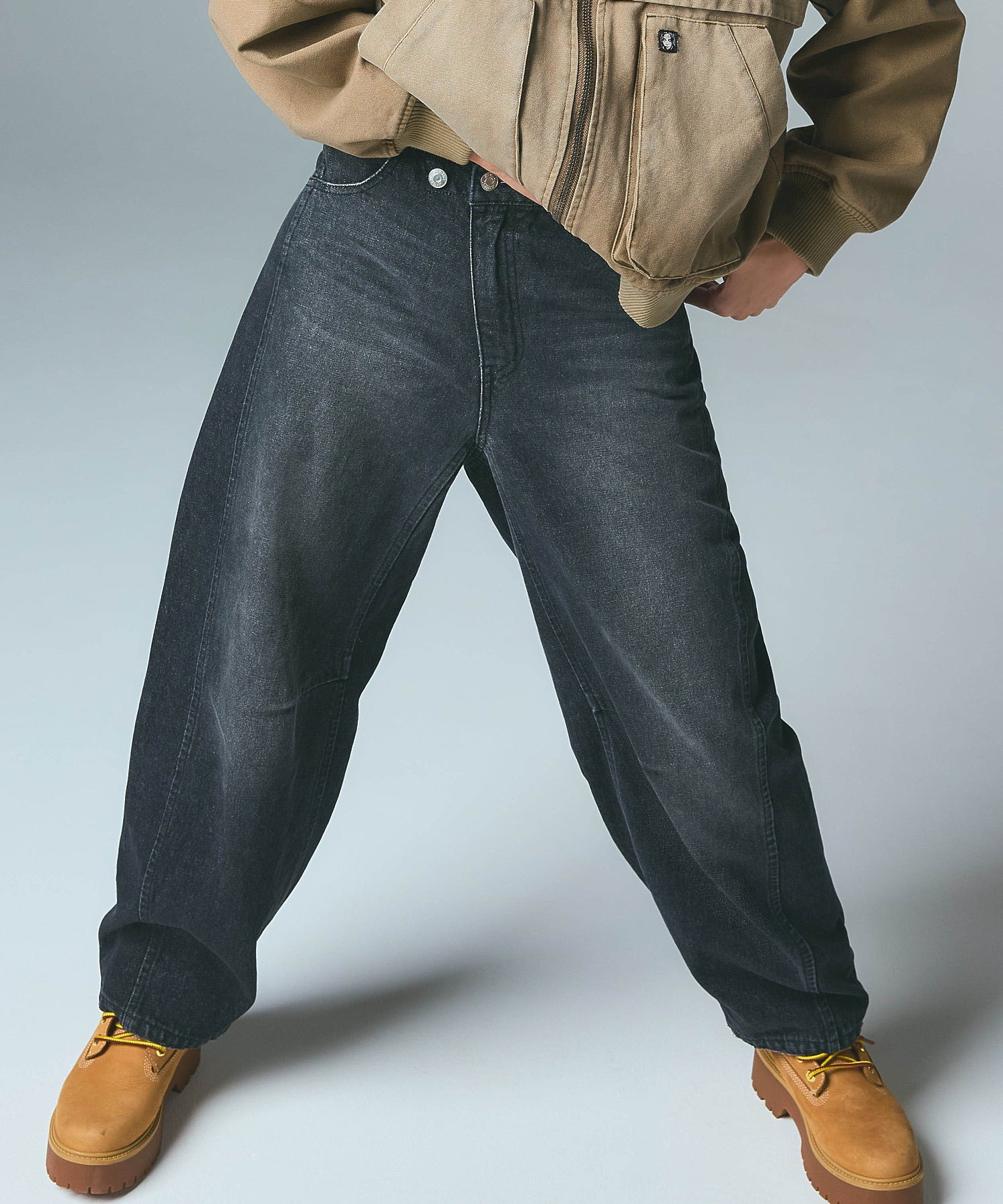 ASYMMETRIC WAIST BARREL LEG DENIM PANTS