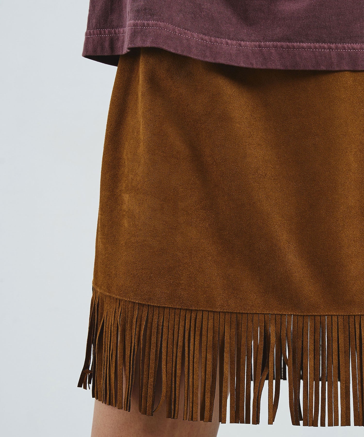 mag.by c/SUEDE-LIKE FRINGE MINI SKIRT