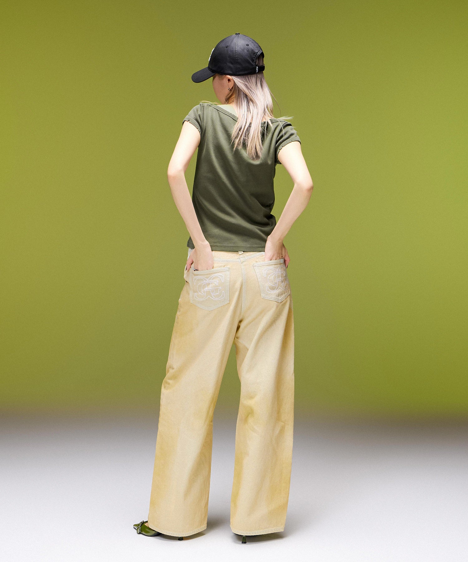 EMBLEM POCKET ASYMMETRIC WAIST DENIM PANTS