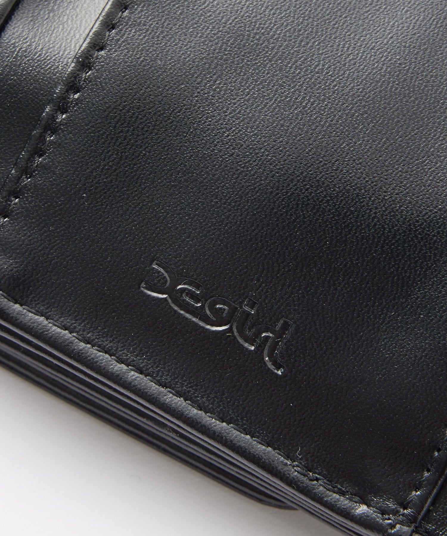 XG EMBLEM BUCKLE FAUX LEATHER MINI WALLET