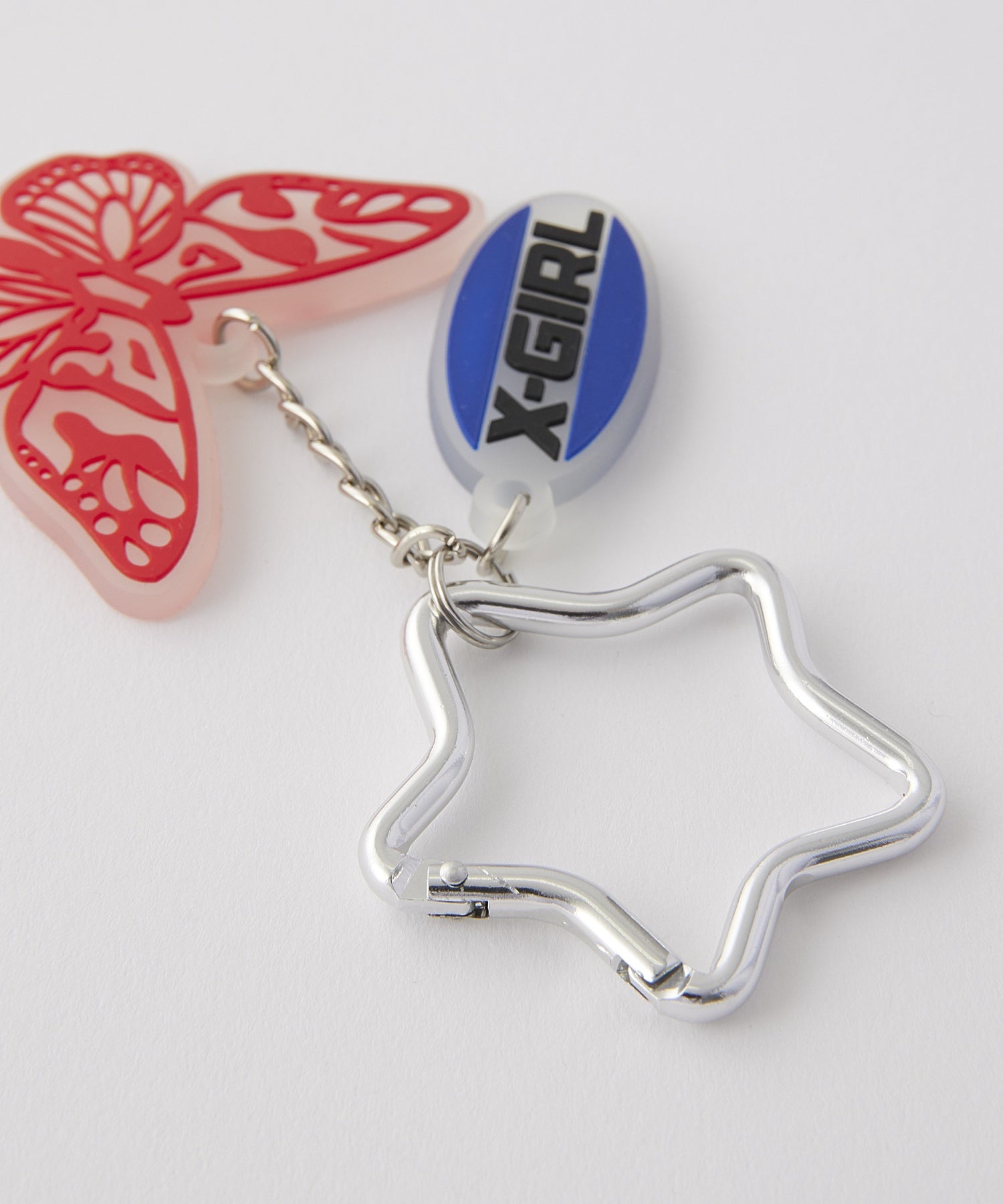 BUTTERFLY AND OVAL LOGO KEY CHARM