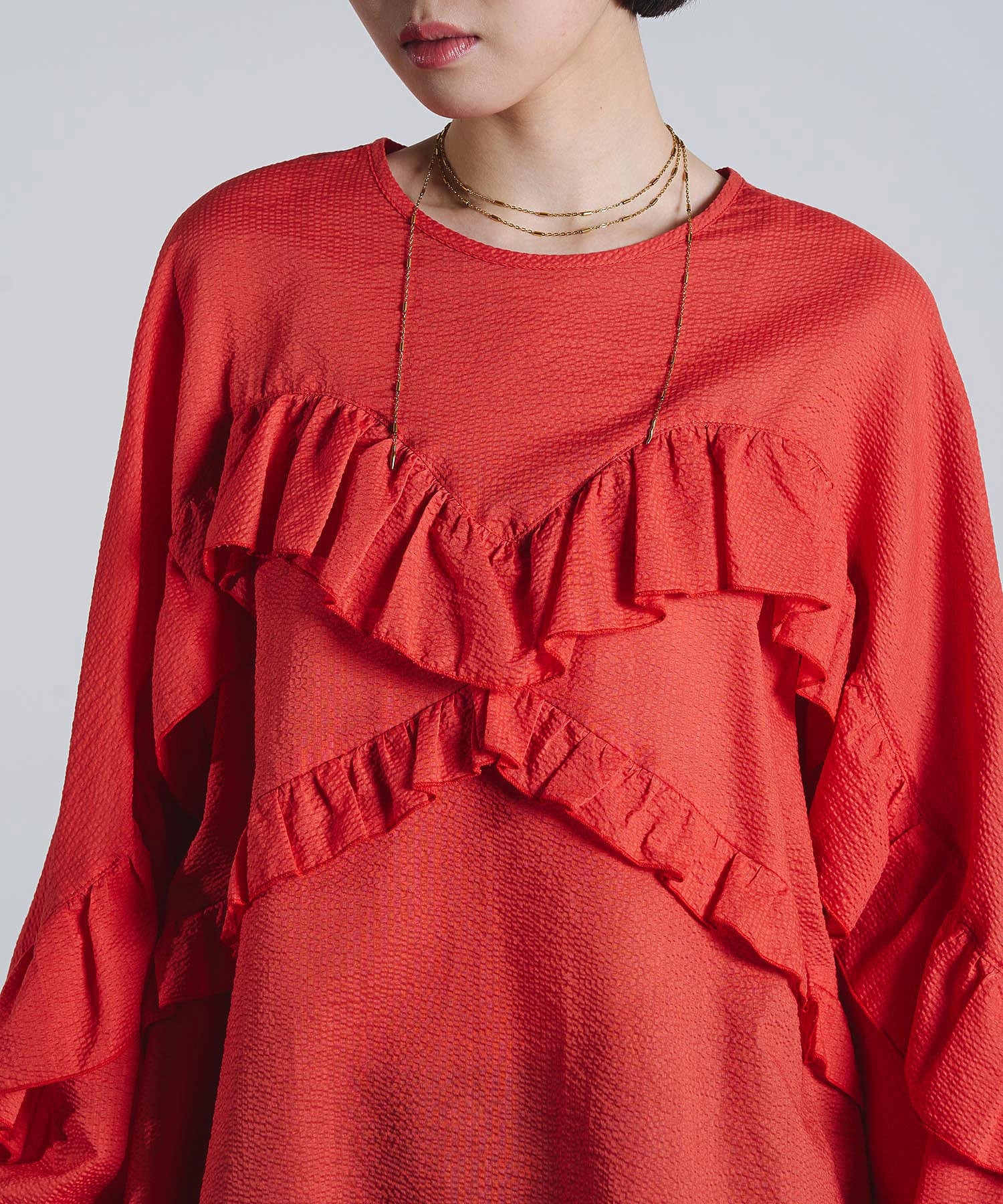 mici/RUFFLE TUNIC BLOUSE