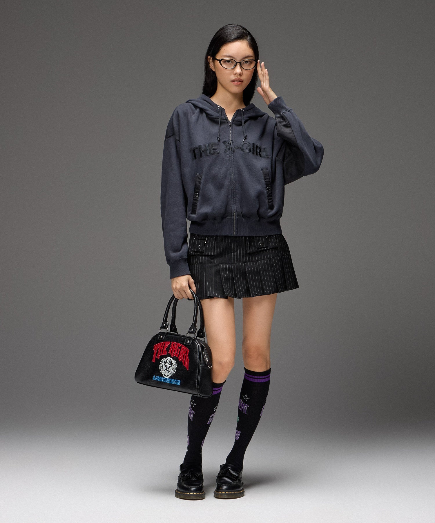 FACE EMBLEM AND LOGO BOSTON BAG