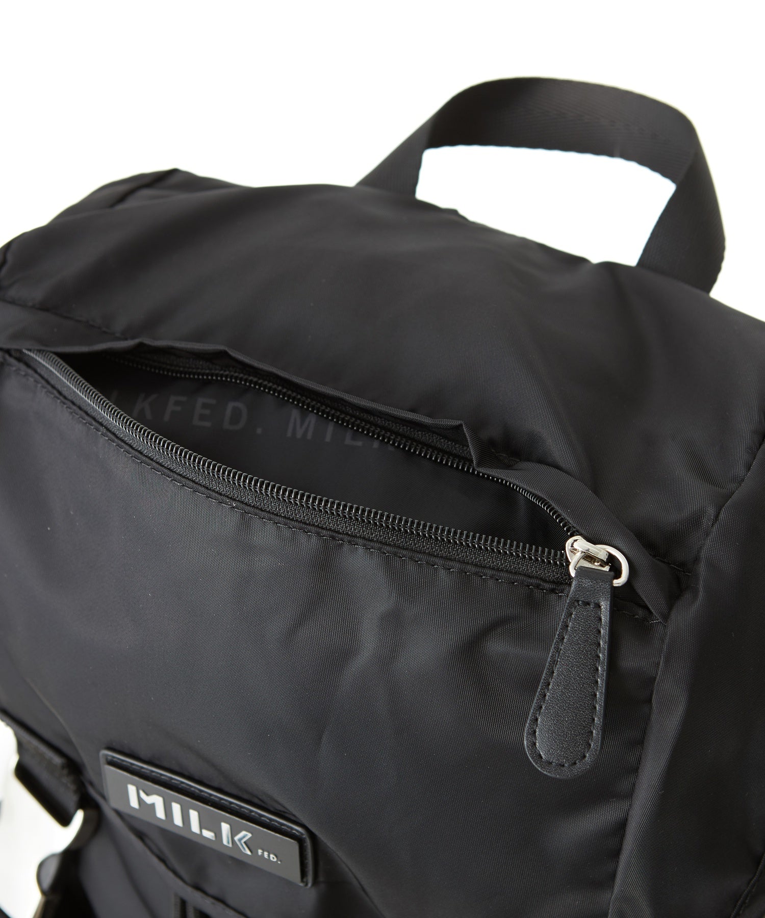 LOGO PLATE BACKPACK MILKFED.