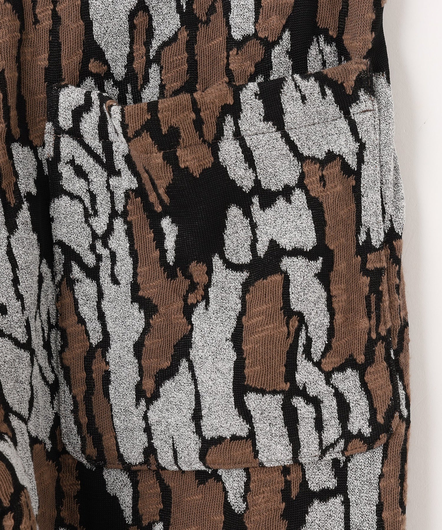 gimcontext/ジム コンテキスト/Trebark Camo Knit Trousers 25505040