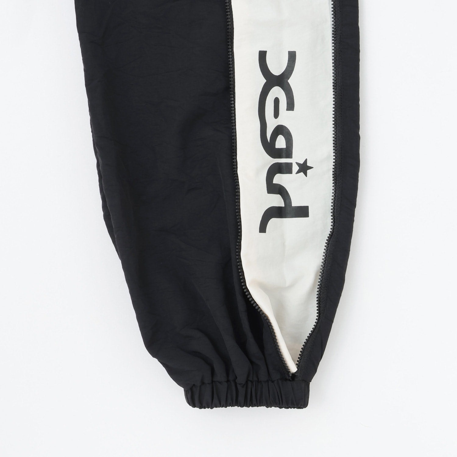 サイドジップ開き配色パンツ