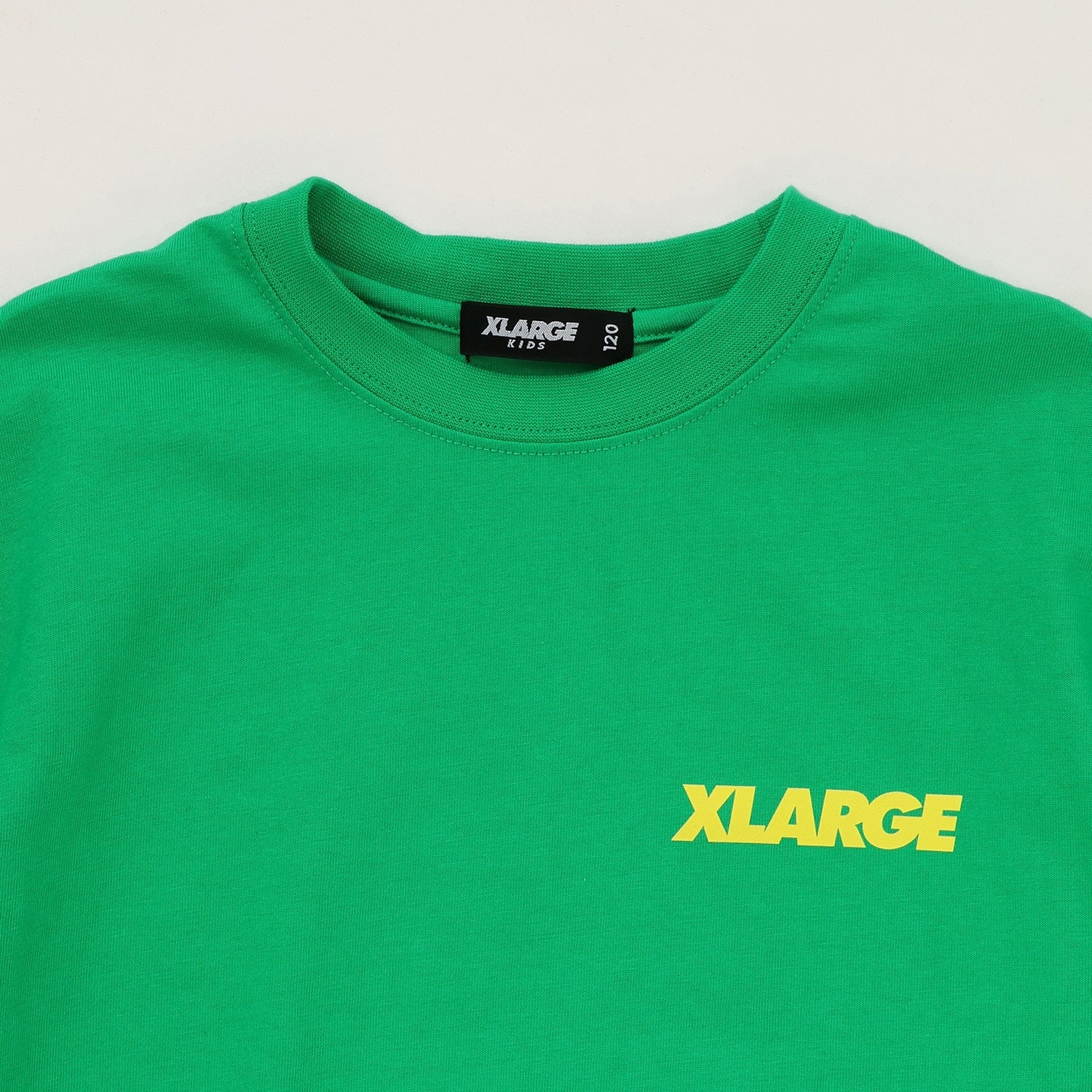 スランテッドOGバックプリント半袖Tシャツ