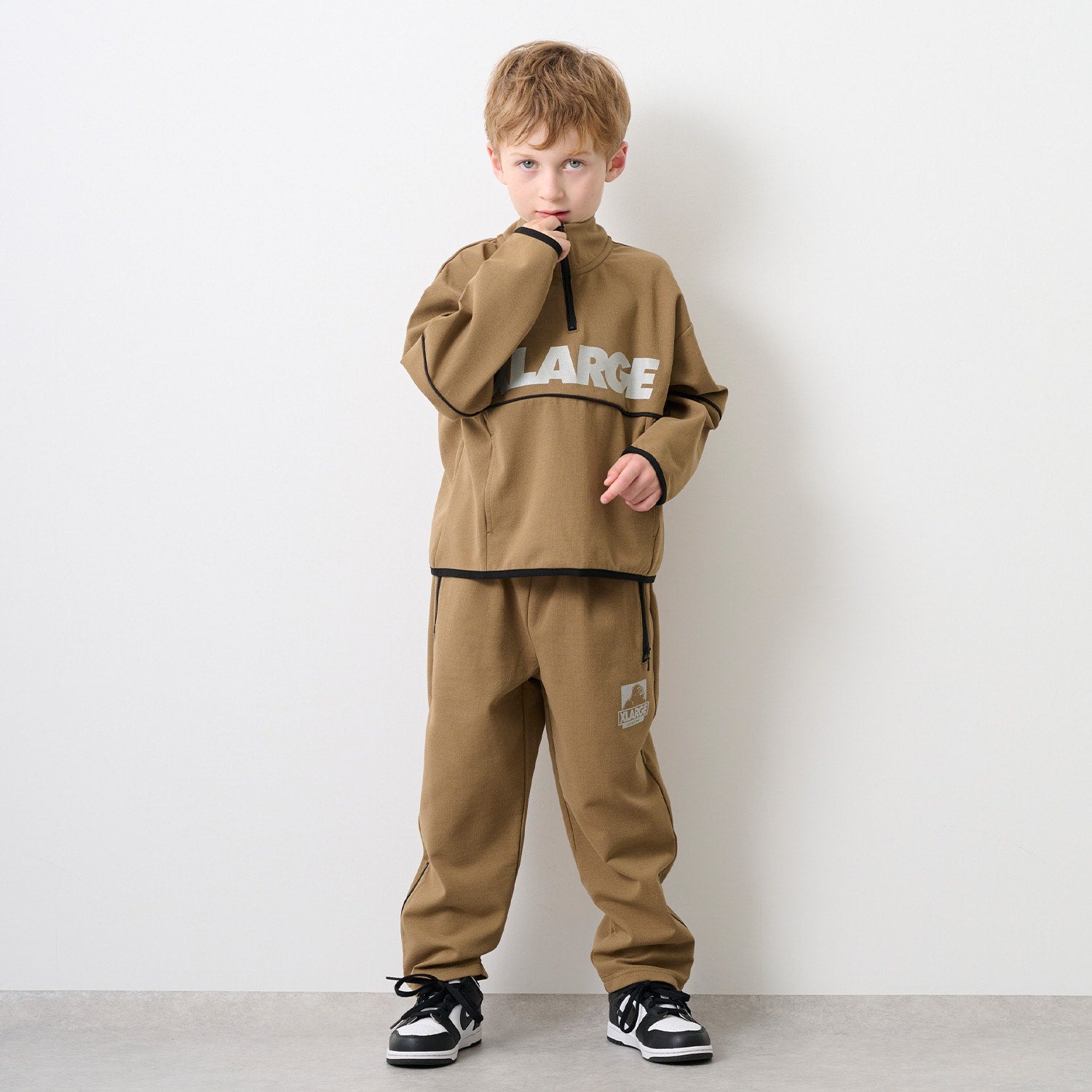 ロゴ ストレッチハーフジップトップ